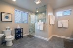 Completely remodeled en-suite bathroom of the master with king and twin bed.